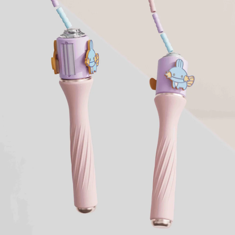 Pink Booboo Bang jump-rope handles with transparent purple housings and mint rope