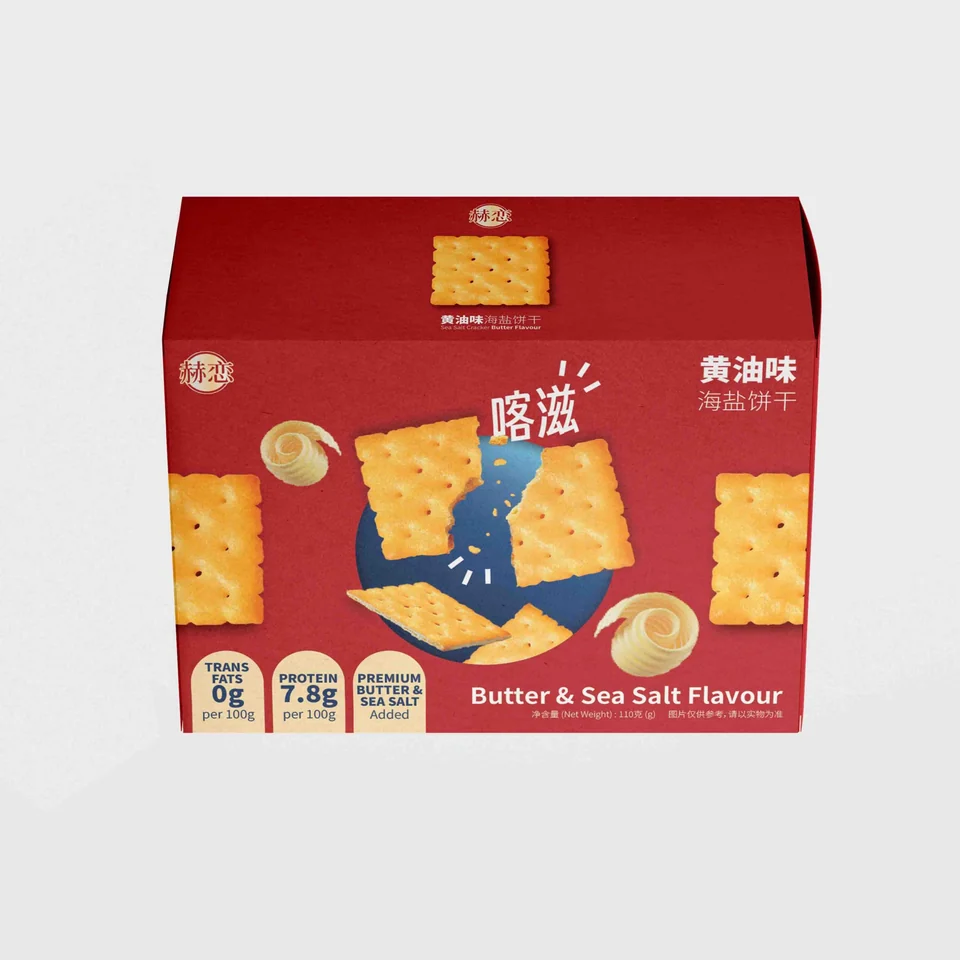 Red sea salt cracker box with golden crackers and blue central lettering