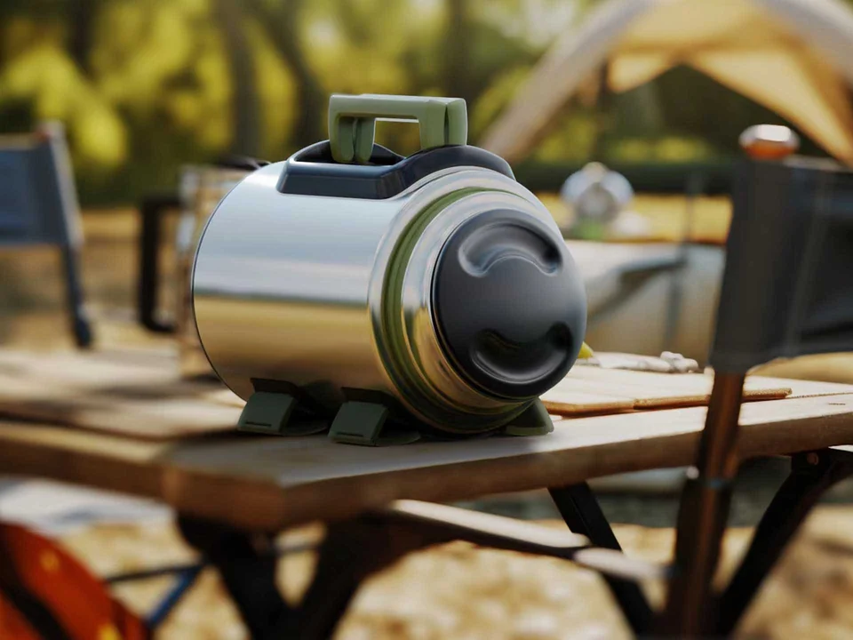 Large TerraJug outdoor flask lying on a camp table with its handled lid in the foreground